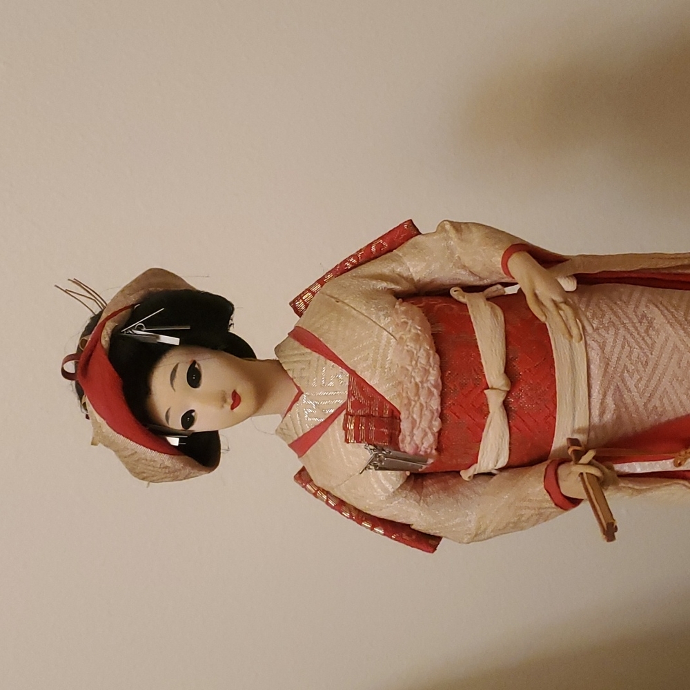 Geisha in White and Red Kimono